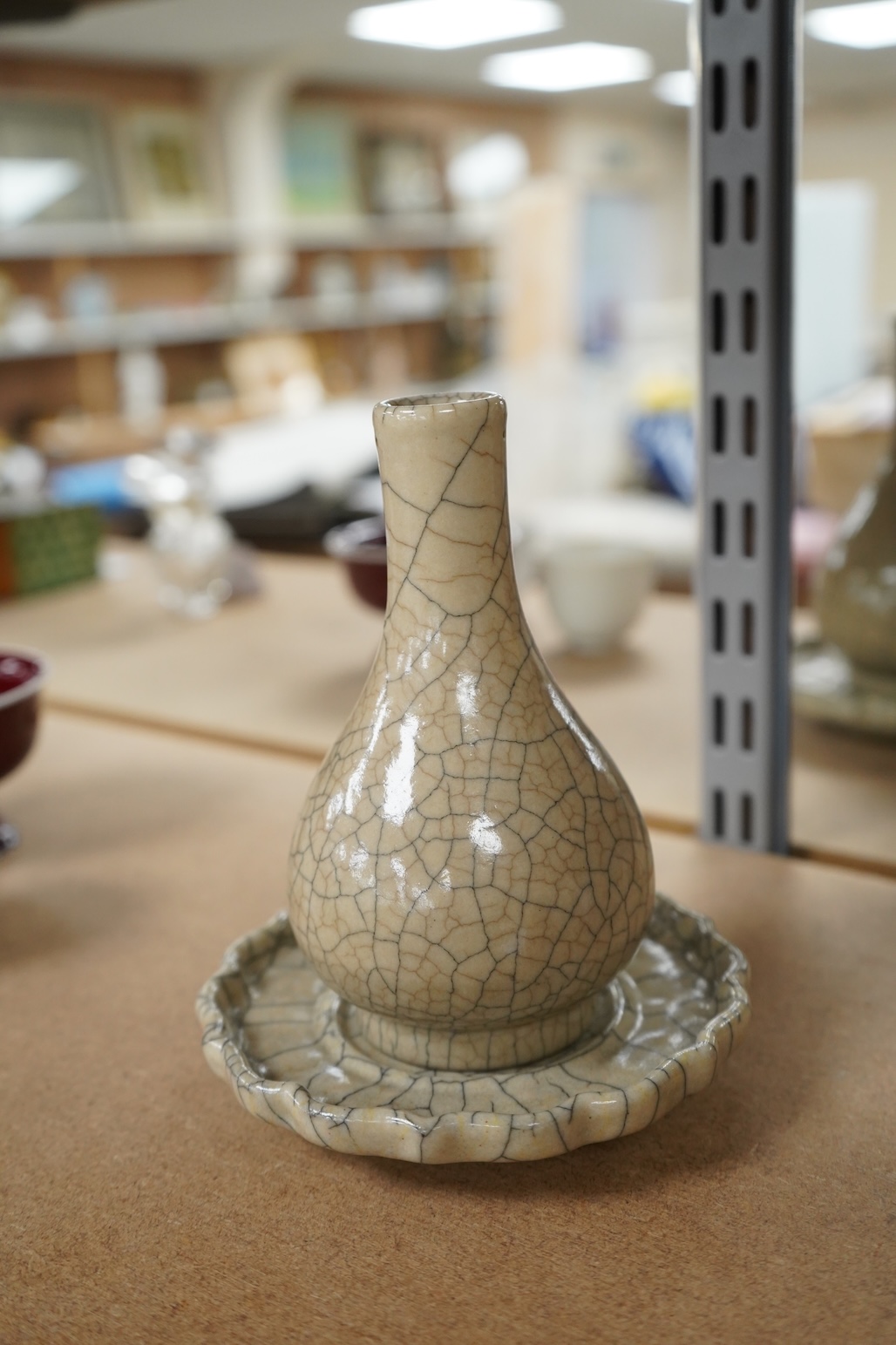 A Chinese crackle glaze bottl vase and similar stand, vase 15cm